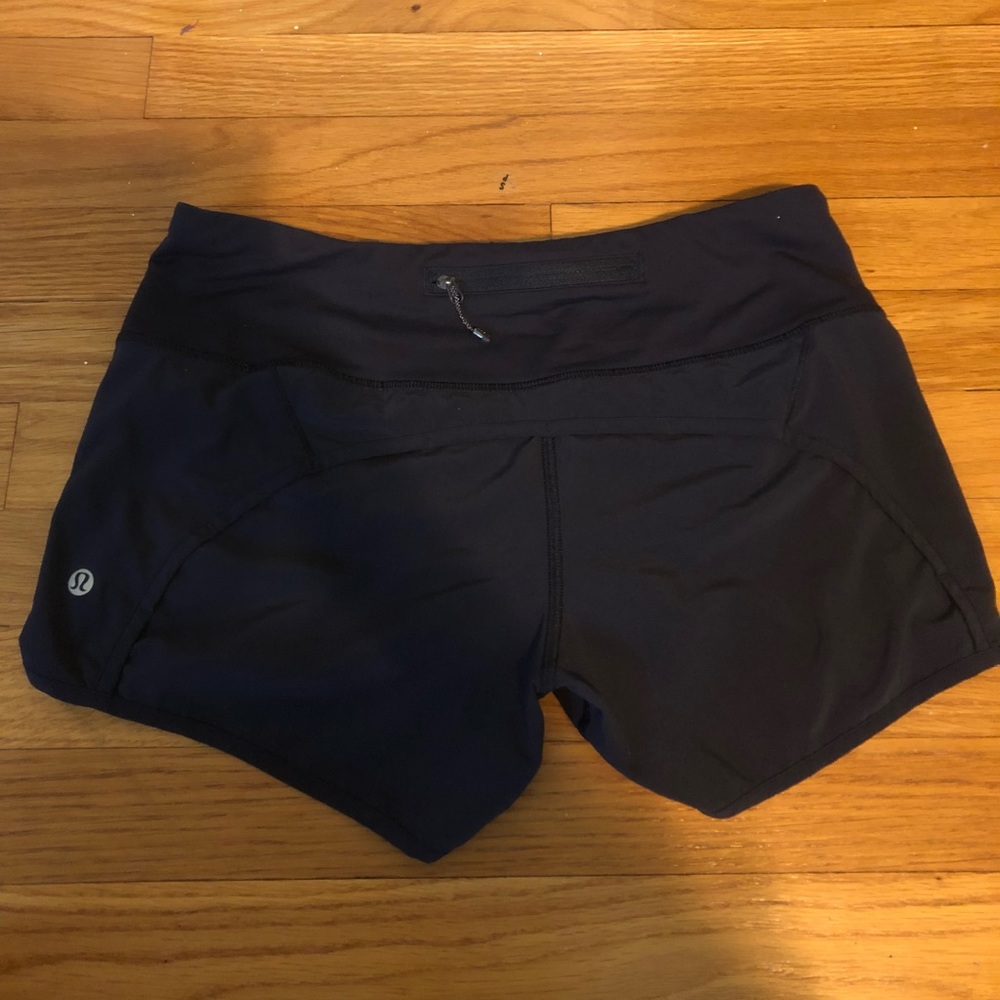 NAVY BLUE LULULEMON SHORTS SIZE 4